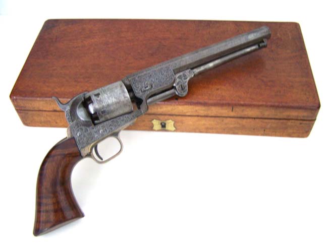 A Fine Cased Gustave Young Engraved Colt Model 1851 Navy Revolver